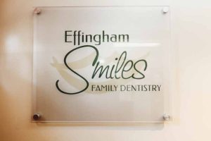 Effingham Smiles Family Dentistry insurance page with logo